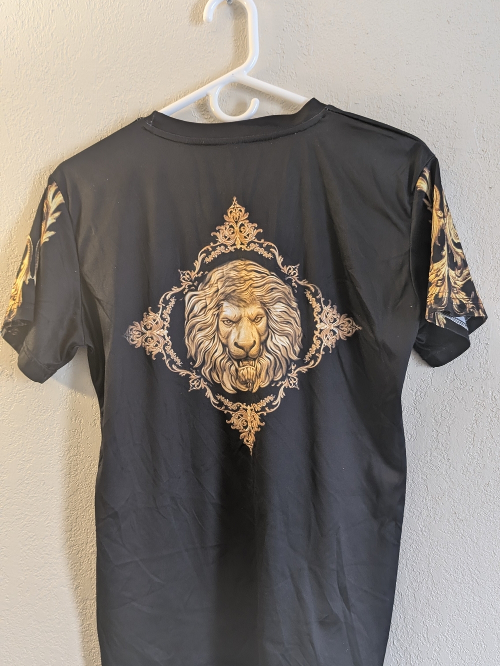 Black Men's Graphic Tee with Gold Lion Motif